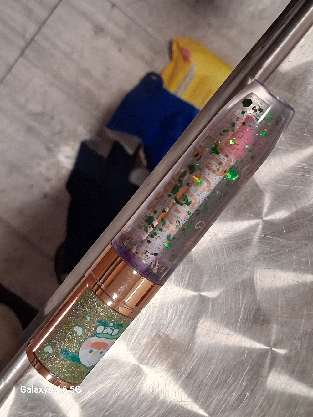 Glittery Rose Gold Lip Gloss with Green Sparkles